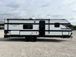 157003